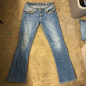 Miss me jeans a little distress on the bottom of the jeans